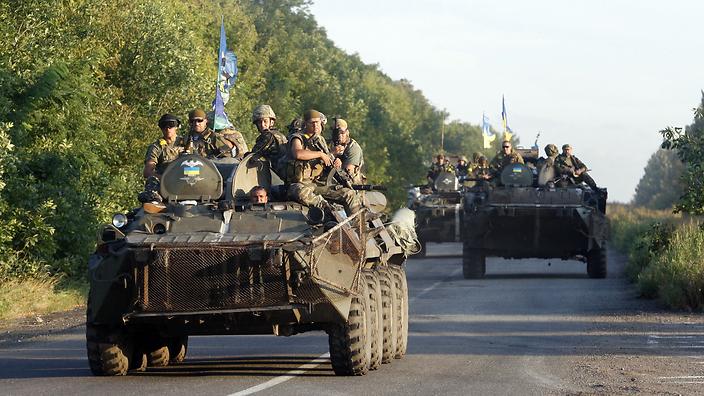 CONFRUNTĂRI ÎN UCRAINA – Un convoi de blindate a trecut frontiera dinspre Rusia: ”Bătălia este în desfăşurare” –