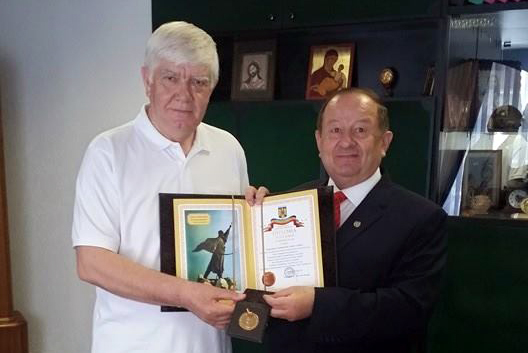 La un deceniu şi jumătate de colaborare / Morega a oferit diplome conducerii ULIM Chişinău