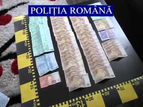 Casele primarilor percheziţionaţi, pline de valută