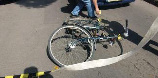 Biciclist accidentat de un pasager neatent
