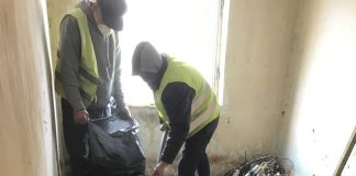 Tone de gunoaie într-un apartament din zona „Diana”