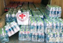 Donație de apă prin Crucea Roșie Gorj! Sticlele ajung în spitale, cămine de bătrâni și instituții din județ
