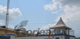 Urmărit național, condamnat pentru evaziune fiscală, găsit de polițiști și dus la penitenciar