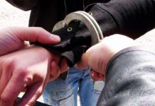 Reținut după ce și-a bătut vecinul