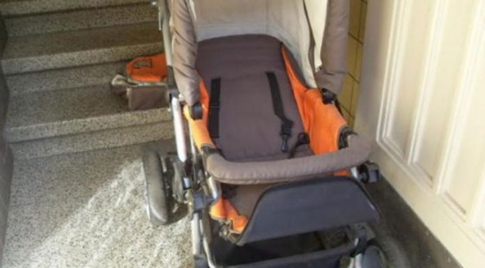 Prinsă după ce a furat un cărucior pentru copii din scara unui bloc