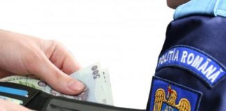 Condamnat cu suspendare după ce a mituit un polițist gorjean