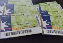 Așteptați la centrul de vaccinare pentru tichetele de masă