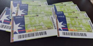 Așteptați la centrul de vaccinare pentru tichetele de masă