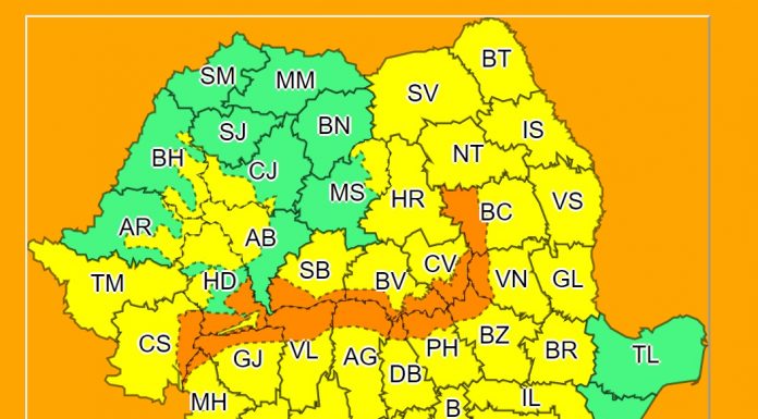 Cod portocaliu de vânt puternic și ninsori la munte
