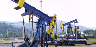 Un salariat a câștigat procesul cu OMV Petrom! Compania, obligată de judecători să-i plătească orele suplimentare
