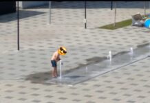 Rovinari: Bărbat amendat după ce s-a spălat la fântânile arteziene