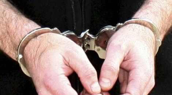 Scandal între vecini încheiat cu reținere