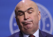 Magistrații își apără pensiile la care umblă Bolojan