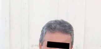 Economistul acuzat de delapidare s-a întors la serviciu, după noaptea petrecută în arest