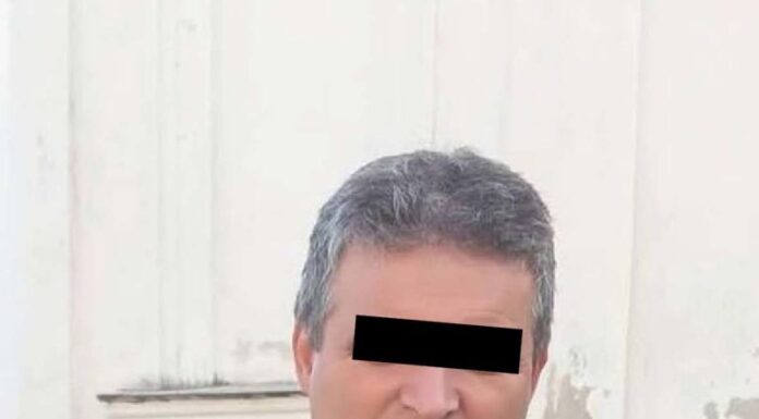 Economistul acuzat de delapidare s-a întors la serviciu, după noaptea petrecută în arest