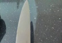 Reținut după ce a ameninţat cu moartea clientul unui bar, punându-i cuțitul la gât