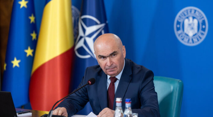 Bolojan vrea să înghețe pensiile și salariile