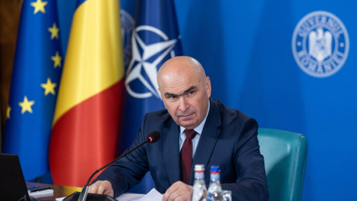 Bolojan vrea să înghețe pensiile și salariile