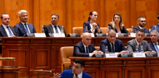 Parlamentarii coaliției, avertizați să nu voteze Moțiunea de cenzură împotriva Guvernului Bolojan