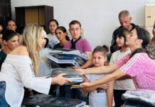 400 de ghiozdane și rechizite pentru elevii proveniți din familii nevoiașe