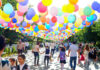 Peste 4.000 de baloane au transformat Calea Eroilor într-un „cer“ colorat, la începutul noului an școlar