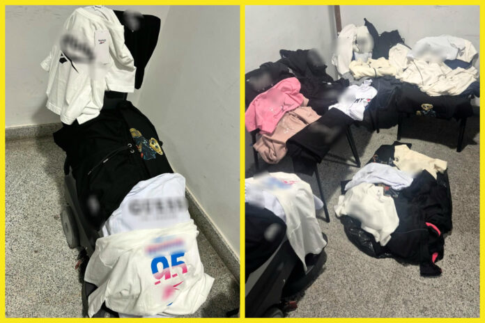 Haine cu sigle de brand, ridicate de polițiști dintr-un magazin din Târgu Jiu. 65 de articole, oprite de la vânzare